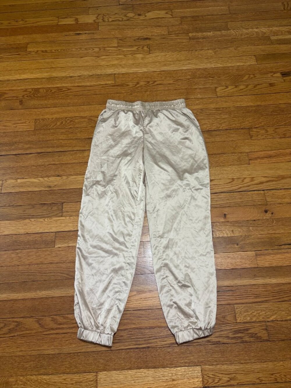 Forever 21 Womens Gold Satin Pants Size Small Elastic Waist Tapered Joggers NWT